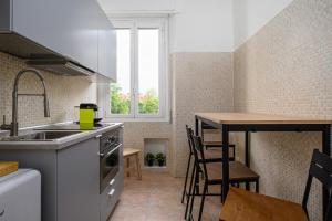Kuchyň nebo kuchyňský kout v ubytování Ennio 8 - Bilocale Cool