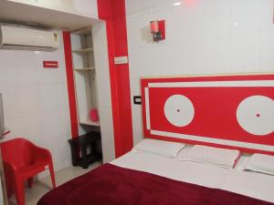 Voodi või voodid majutusasutuse Deepak Lodge walkable Distance From ksrtc busstand toas