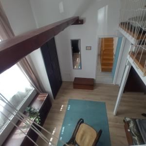 a view of the living room from the loft at Old Buda Family Home in Budapest