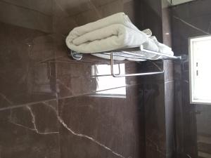 Koupelna v ubytování Hotel Rajshree + 15 fotografií