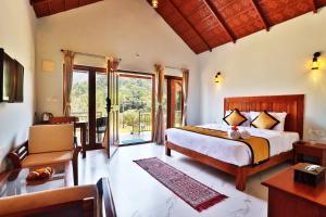 Postel nebo postele na pokoji v ubytování Hill Crest Resort - Coorg