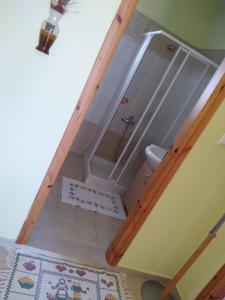 an overhead view of a bathroom with a toilet at DREAMY SOUTH in Frangokastello +37 photos