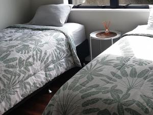 Postel nebo postele na pokoji v ubytování Humble Abode