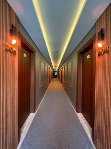 a hallway of an office building with a long corridor at Poyraz Hotel Uzungöl in Uzungöl