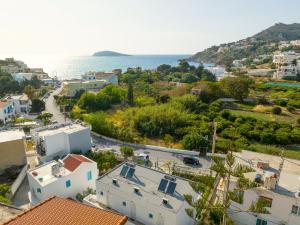 an aerial view of a town and the ocean at Verano Apartments in Kalymnos