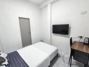 Postel nebo postele na pokoji v ubytování Kanbo Stay