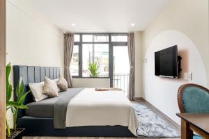 Televiisor ja/või meelelahutuskeskus majutusasutuses Jan Hostel Central Point