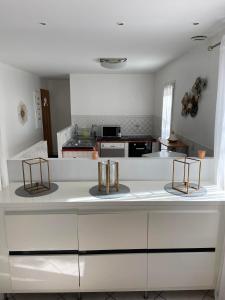 Kuchyňa alebo kuchynka v ubytovaní Maison Sainte Marthe