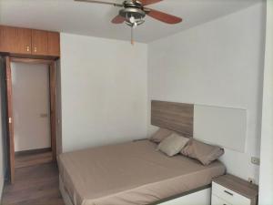 Posteľ alebo postele v izbe v ubytovaní Apartamento Fabricio