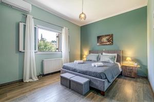Un pat sau paturi într-o cameră la Thomas House