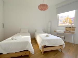 Posteľ alebo postele v izbe v ubytovaní JUAN DE AUSTRIA Duplex Penthouse 4PAX