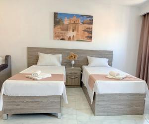 Postel nebo postele na pokoji v ubytování For Rest Aparthotel