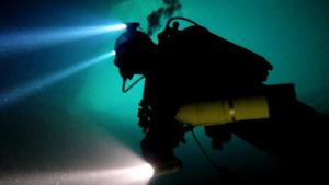 a person standing on top of a fire hydrant at Casa sul Fiume County House in Solagna