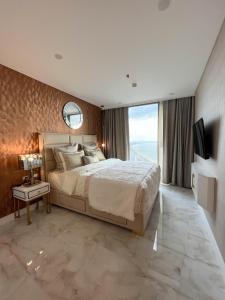Postel nebo postele na pokoji v ubytování Copacabana luxury apartments