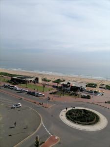 an empty parking lot next to the beach at Unit 104 @Tenbury in Durban