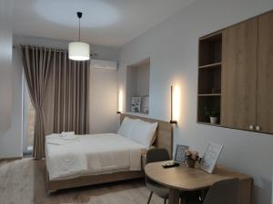 Postel nebo postele na pokoji v ubytování Elvish Garden Boutique B&B