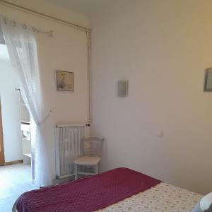 Postel nebo postele na pokoji v ubytování Hotel Font De Lauro