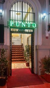 A fachada ou entrada em Punto Suite