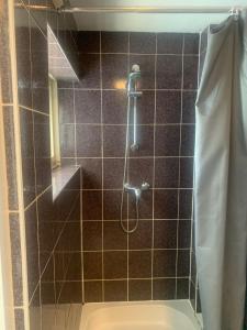 Koupelna v ubytování Hotel Flevo