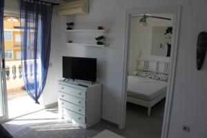 Posteľ alebo postele v izbe v ubytovaní Xaloc Solo Familias Serviplaya