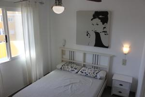 Posteľ alebo postele v izbe v ubytovaní Xaloc Solo Familias Serviplaya
