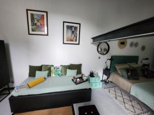 Postel nebo postele na pokoji v ubytování Le clos Pascaline