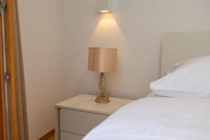 Postel nebo postele na pokoji v ubytování Apartments Lea
