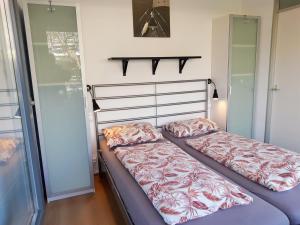 Ένα ή περισσότερα κρεβάτια σε δωμάτιο στο ZON Bed by the Sea