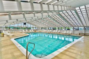 a large swimming pool with a glass ceiling at Century I 1622 in Ocean City