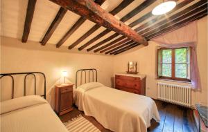 A bed or beds in a room at Il Colle