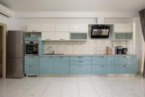 Kuchyň nebo kuchyňský kout v ubytování Apartments Lea