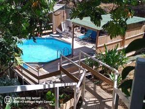 O vedere a piscinei de la sau din apropiere de Villas Manguier ou Villa Poivriers