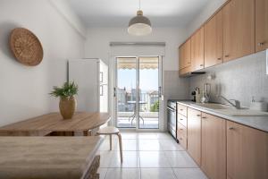 Kuchyň nebo kuchyňský kout v ubytování Summer Vibes by Luxlikehome