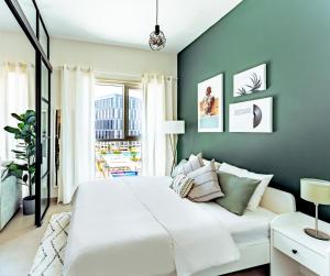 Кровать или кровати в номере First Class 1BR Apartment in Dubai Hills - next to Dubai Hills Mall