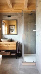 a bathroom with a shower and a sink at Domek na Kleninie z gorącą balią in Kamienica +38 photos