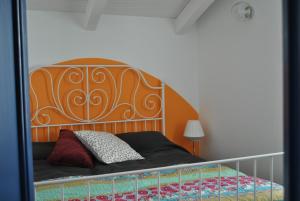 44 Passi Holiday Home tesisinde bir odada yatak veya yataklar