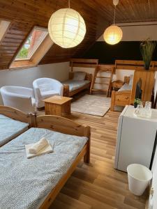 Posezení v ubytování Global Apartmanház + 37 fotografií