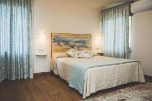 Posteľ alebo postele v izbe v ubytovaní Agriturismo Rivella