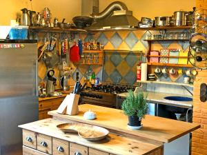 a kitchen with a wooden counter top in a kitchen at Wie im Himmel in Hatzfeld