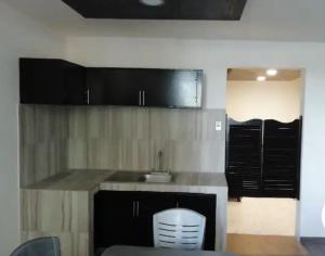 Η κουζίνα ή μικρή κουζίνα στο Departamento excelente zona