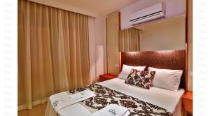 Cama o camas de una habitación en Çınarlar Apart Hotel KAŞ