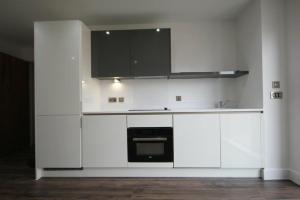 Kuchyň nebo kuchyňský kout v ubytování 2 Bedroom Apartment - Birmingham city centre