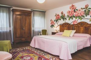 Posteľ alebo postele v izbe v ubytovaní Agriturismo Rivella