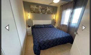 Postel nebo postele na pokoji v ubytování Villa ALCANAR PLATJA + 9 fotografií