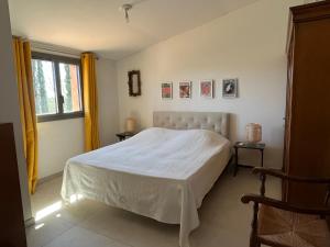 Ένα ή περισσότερα κρεβάτια σε δωμάτιο στο Villa Cazat Rozat