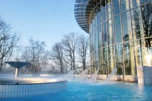 a water fountain in front of a building at Hotel Cardinal in Spa