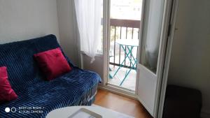 Posedenie v ubytovaní APPARTEMENT T2 confort,Parking,balcon,près Parc des Expositions,10 minutes plage