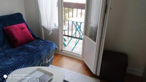 Posedenie v ubytovaní APPARTEMENT T2 confort,Parking,balcon,près Parc des Expositions,10 minutes plage