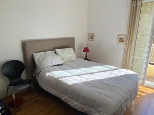 En eller flere senge i et værelse på Le Minerve