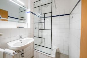 Ένα μπάνιο στο Aparthotel Alma Bonn +35 φωτογραφίες